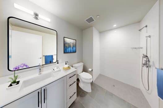 88 fourth St bathroom with white cabinets